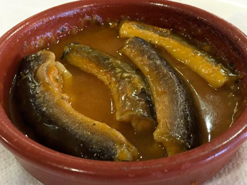 Very traditional dish. Very traditional dis, eels with juice.